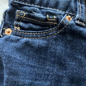 Cat & Jack kids blue jeans size 4T. Gold stitching around pockets.